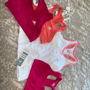 3 new sport bras and 1 body sports bra